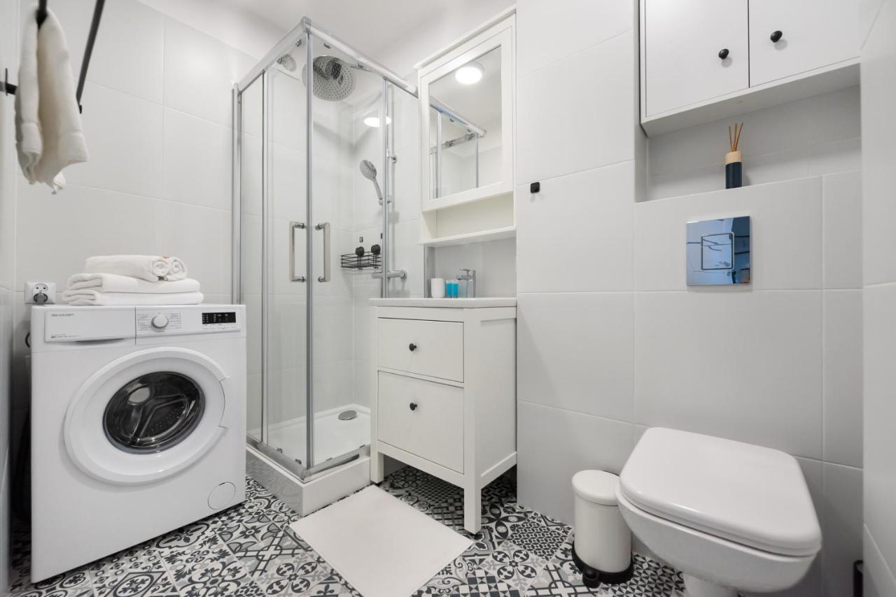 Nowogrodzka Grey Apartment Warsaw